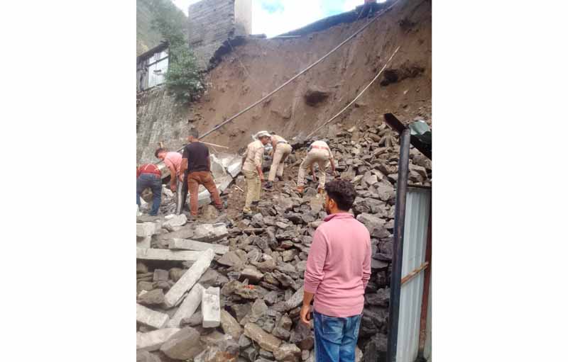 Rescue operation in progress after landslide hit Rattle Hydel Project site in Kishtwar on Thursday. -Excelsior/Ajay Shan